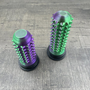 Een paars met groene stimming-tool voor autisme en overprikkeling