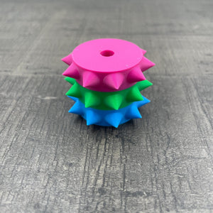 Een los rollertje voor een BDSM pinwheel in de kleuren van de poly-seksuele vlag