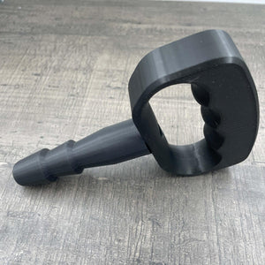 Een adapter voor vac-u-lock seks toys met een zwarte handgreep.