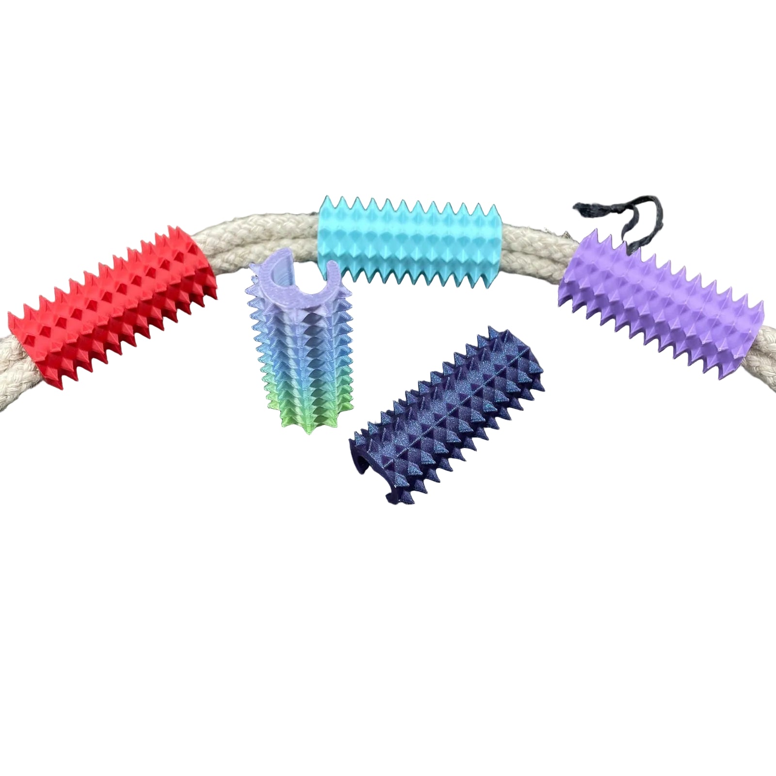Shibari rope spikes in verschillende kleuren met een touw er doorheen