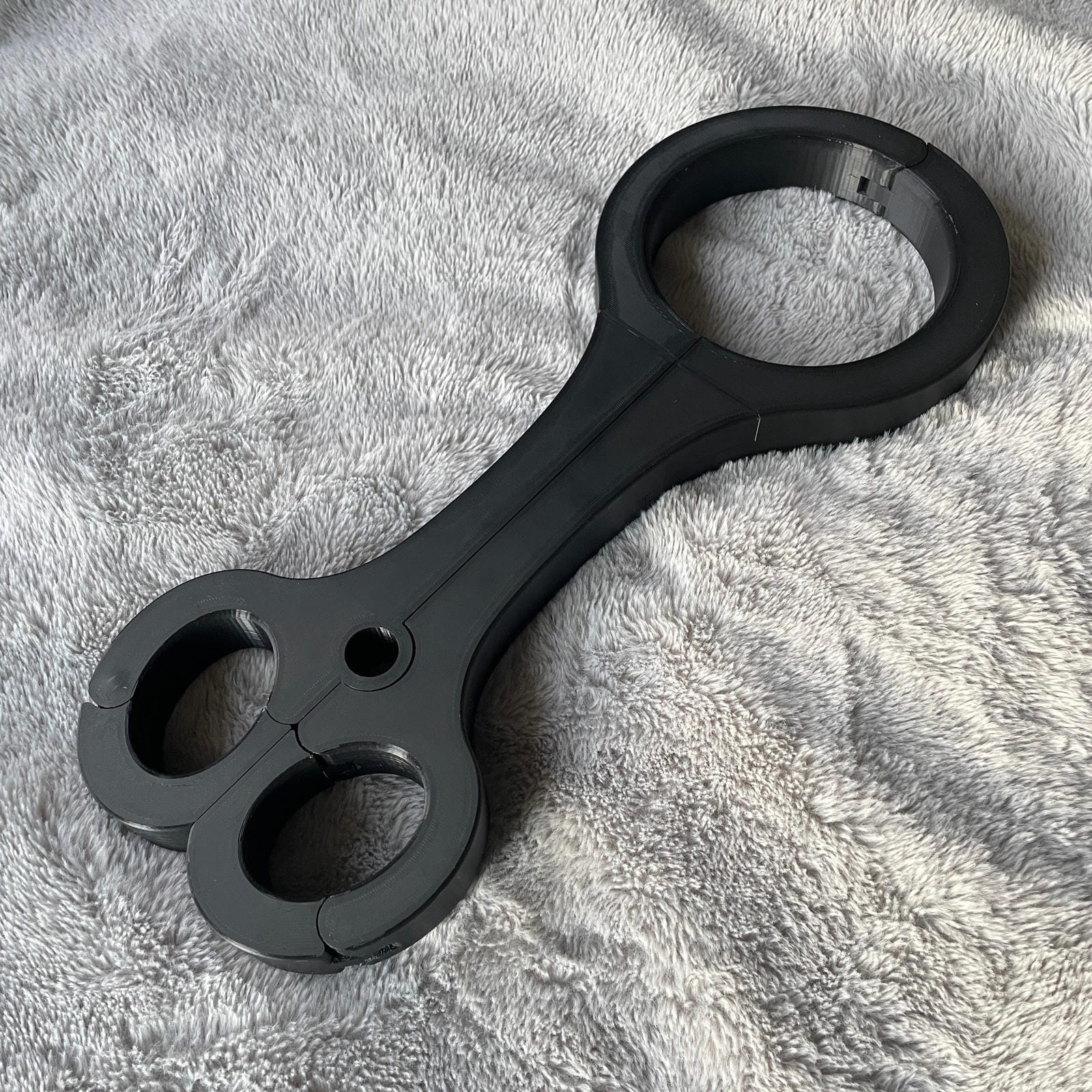 Een BDSM rigid fiddle in het zwart