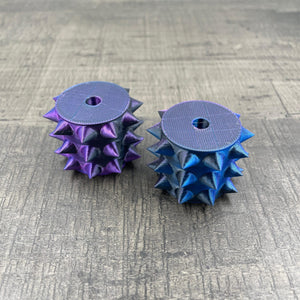 Een los rollertje voor een BDSM pinwheel in zwart/paars/blauw