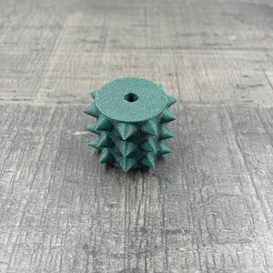 Een los rollertje voor een BDSM pinwheel in groen met glitters