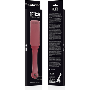 A vegan leather paddle for BDSM in red, with box